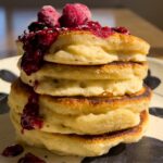 Pancakes stacked on plate