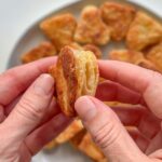 Hand holding puff pastry