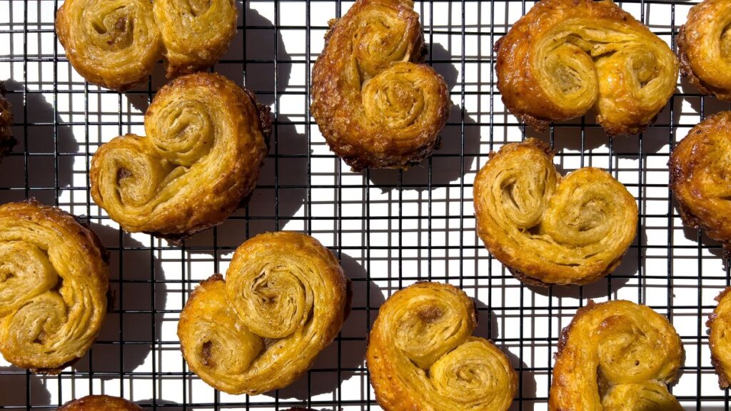 Palmier cookies on wire rack