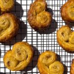 Palmier cookies on wire rack