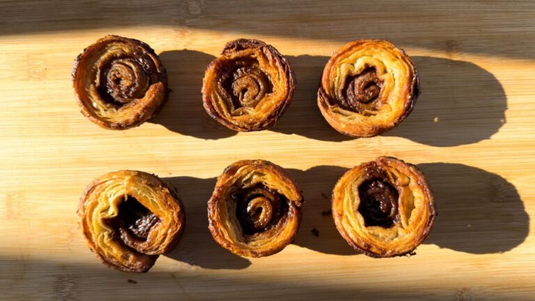 cinnamon cruffins on cutting board